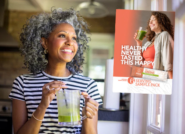 Woman drinking Pro-Active Greens